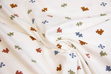 Jersey mit kleinen Puzzleteilen, ecru, 0,5 m